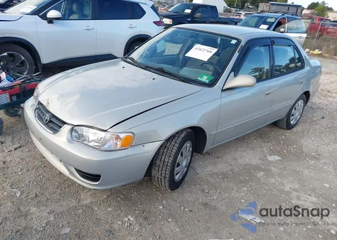 2001 Toyota Corolla Le из США, поврежденный, VIN 2T1BR12E21C470356